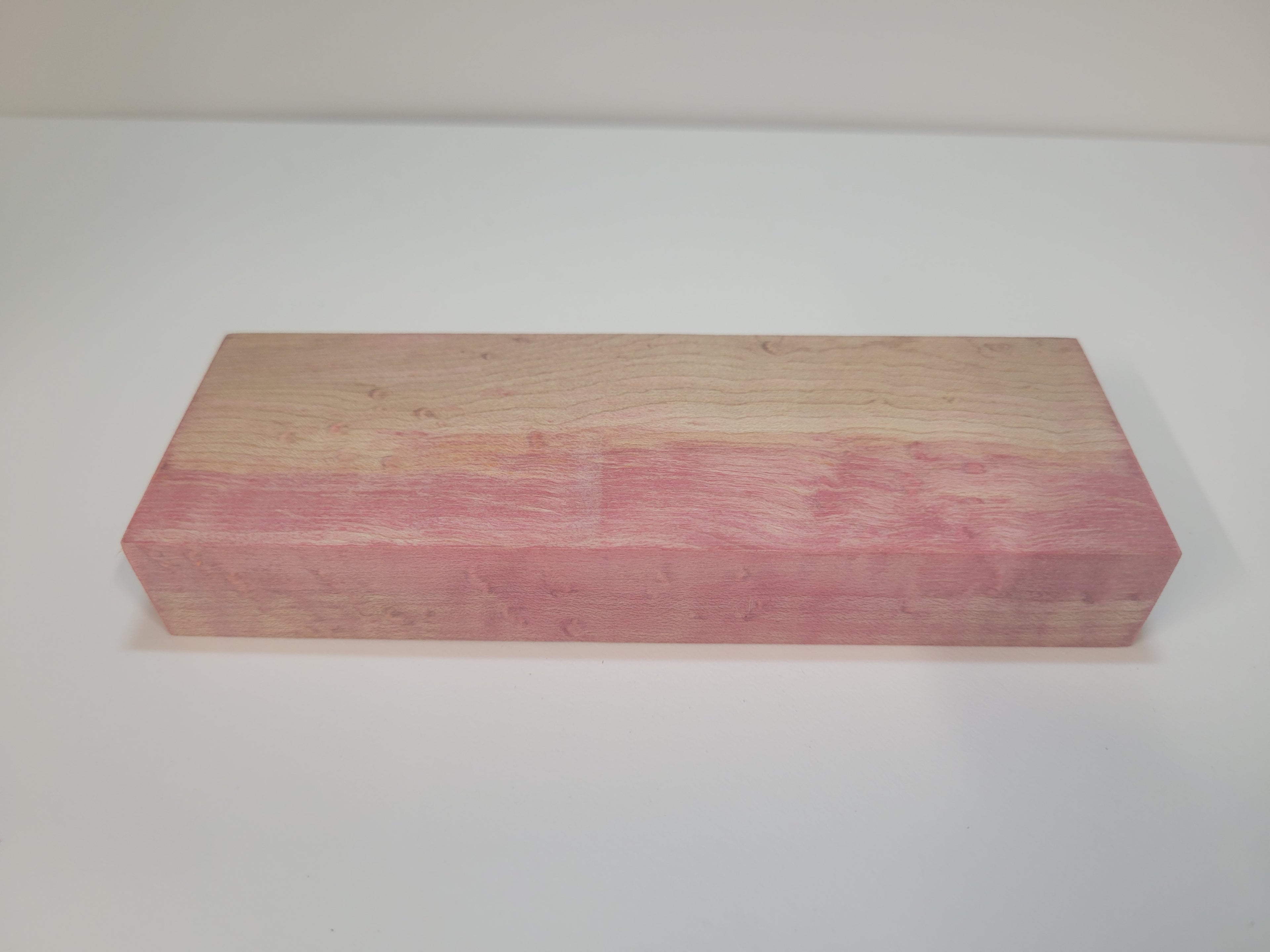 Red and orange dyed birdseye maple - stabilized